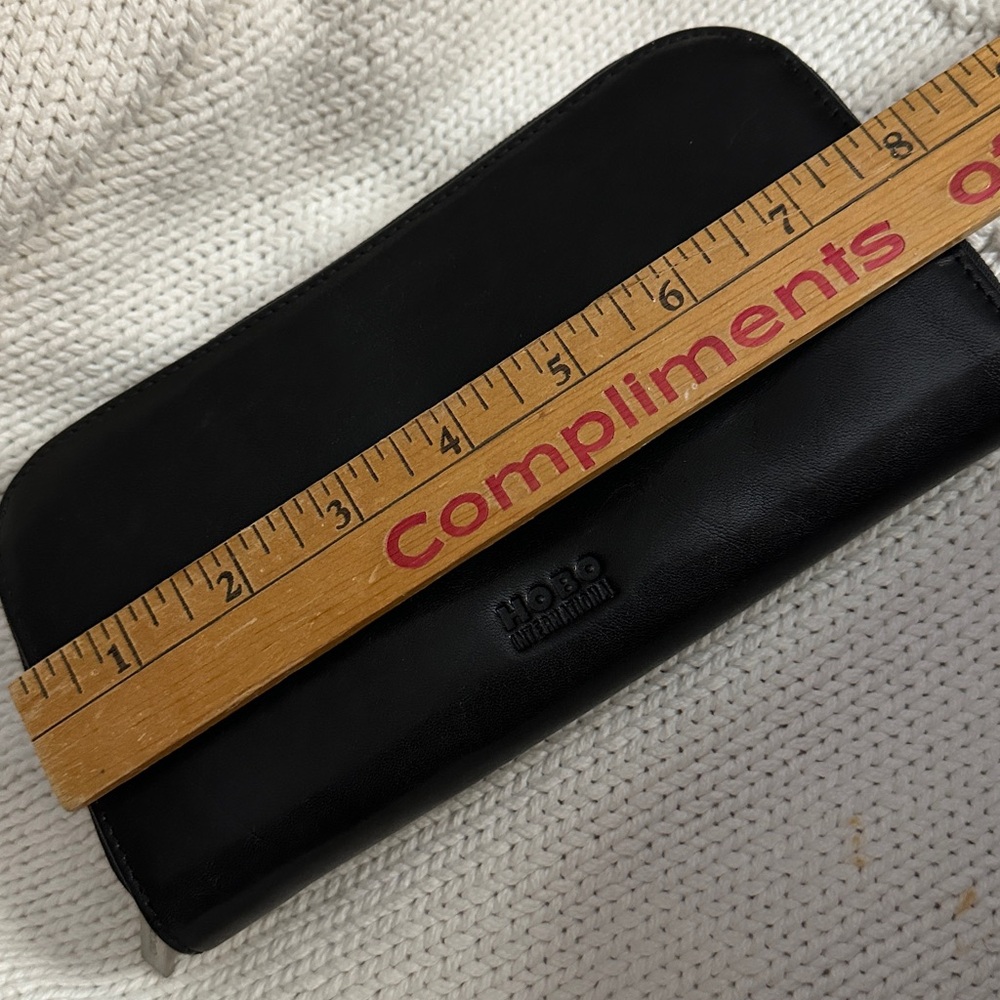 - Vintage HOBO International black smooth leather wallet Clutch